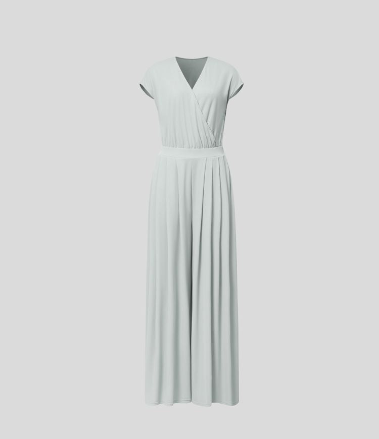 Jumpsuit™ - Tuta con scollatura a V, maniche corte, tasche laterali a pieghe e gamba larga, motivo a onde fluide.